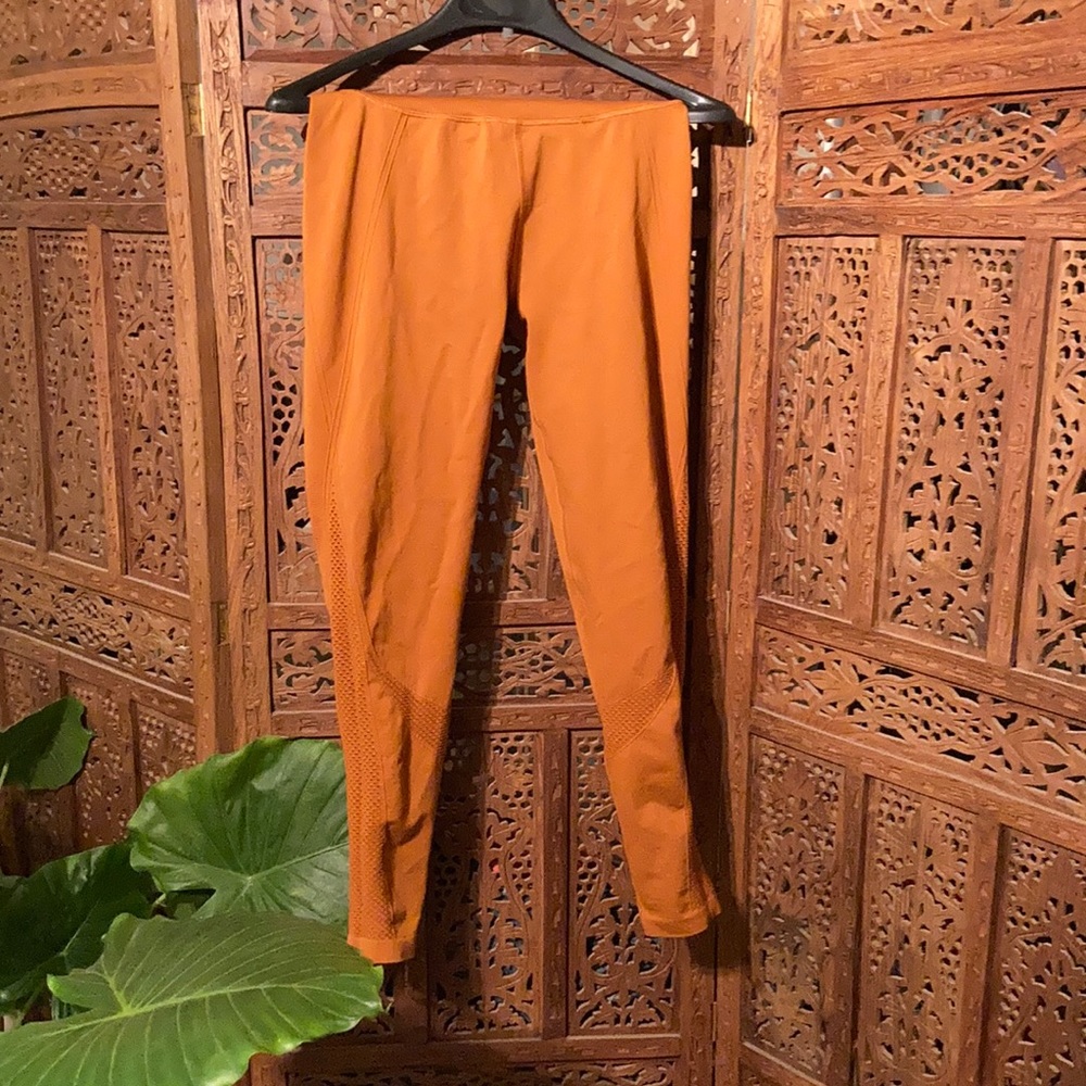 Orange athletic leggings 🍊